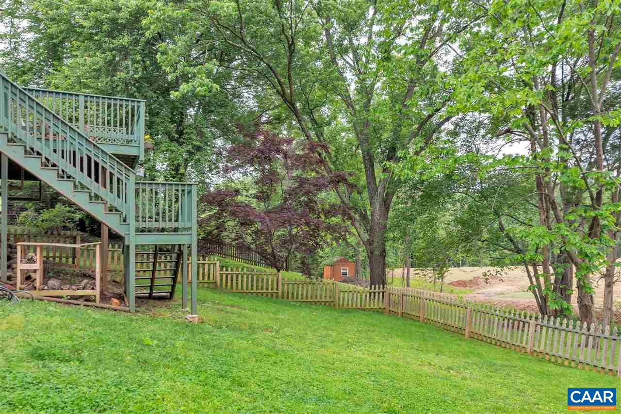 960 Claudius Court Crozet, VA 22932 - Photo 20 of 22 a view of house with a yard and a trees