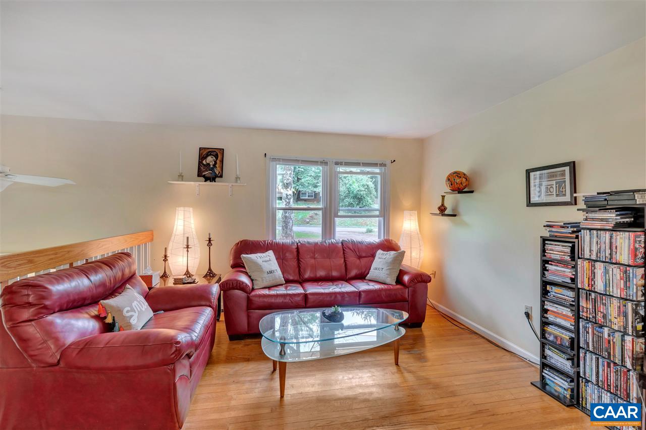 960 Claudius Court Crozet, VA 22932 - Photo 3 of 22 a living room with furniture and a wooden floor