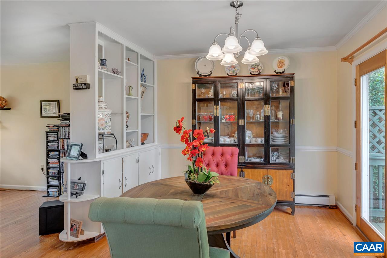 960 Claudius Court Crozet, VA 22932 - Photo 6 of 22 a view of a dining room with furniture and chandelier