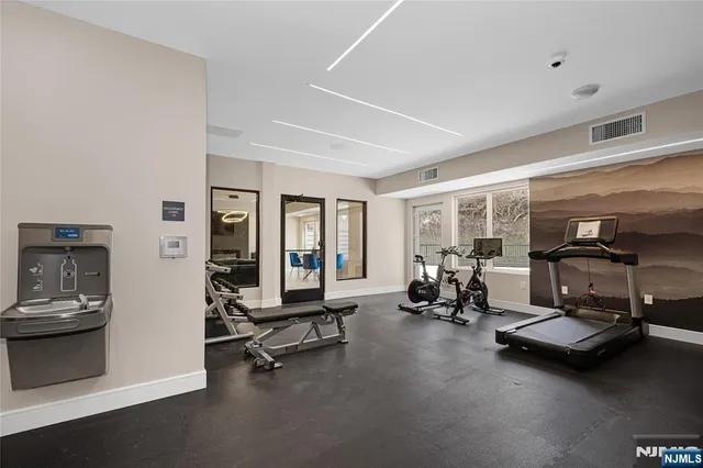 a view of a room with gym equipment