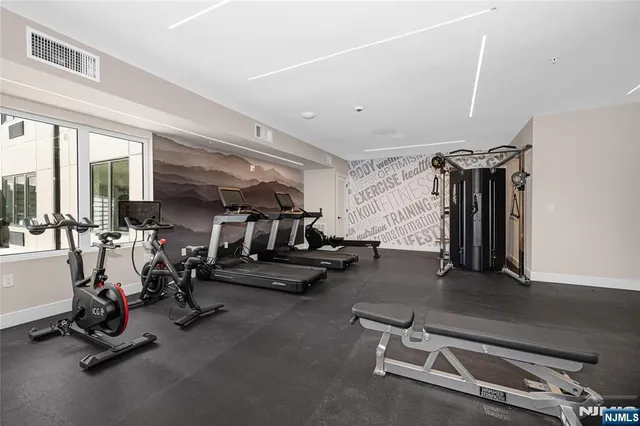 a view of a room with gym equipment