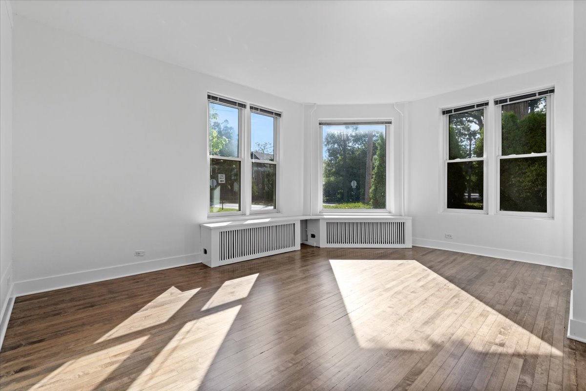 1097 Tower Road, Unit A Winnetka, IL 60093 - Photo 4 of 17 a view of a room with a large window