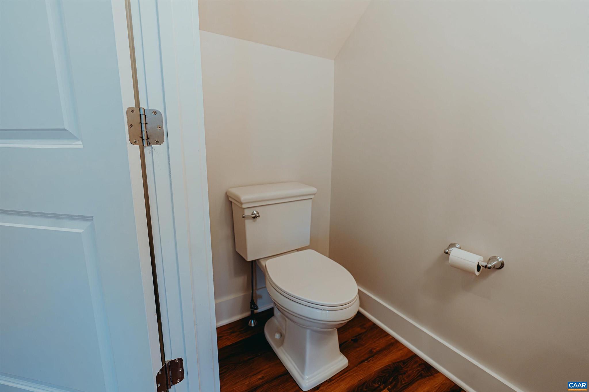 528 Trailside Drive Charlottesville, VA 22911 - Photo 11 of 51 a white toilet sitting next to a shower
