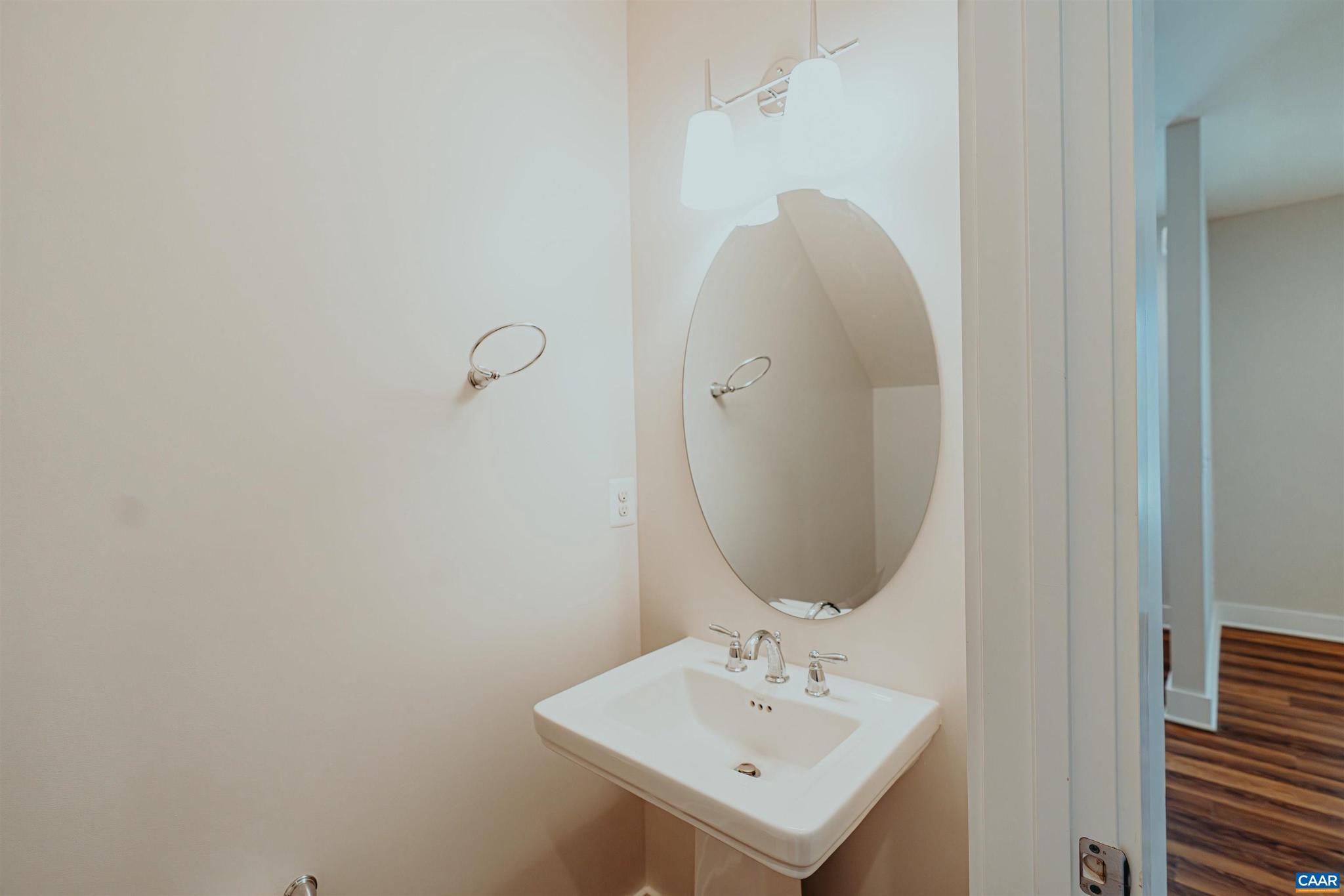528 Trailside Drive Charlottesville, VA 22911 - Photo 12 of 51 a bathroom with a sink a mirror and vanity