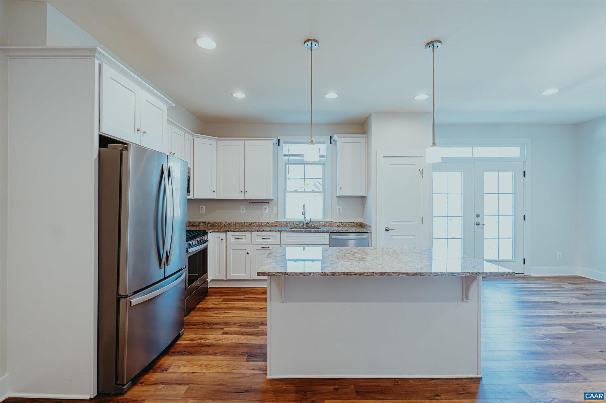 528 Trailside Drive Charlottesville, VA 22911 - Photo 17 of 51 a kitchen with kitchen island a counter top space stainless steel appliances and cabinets