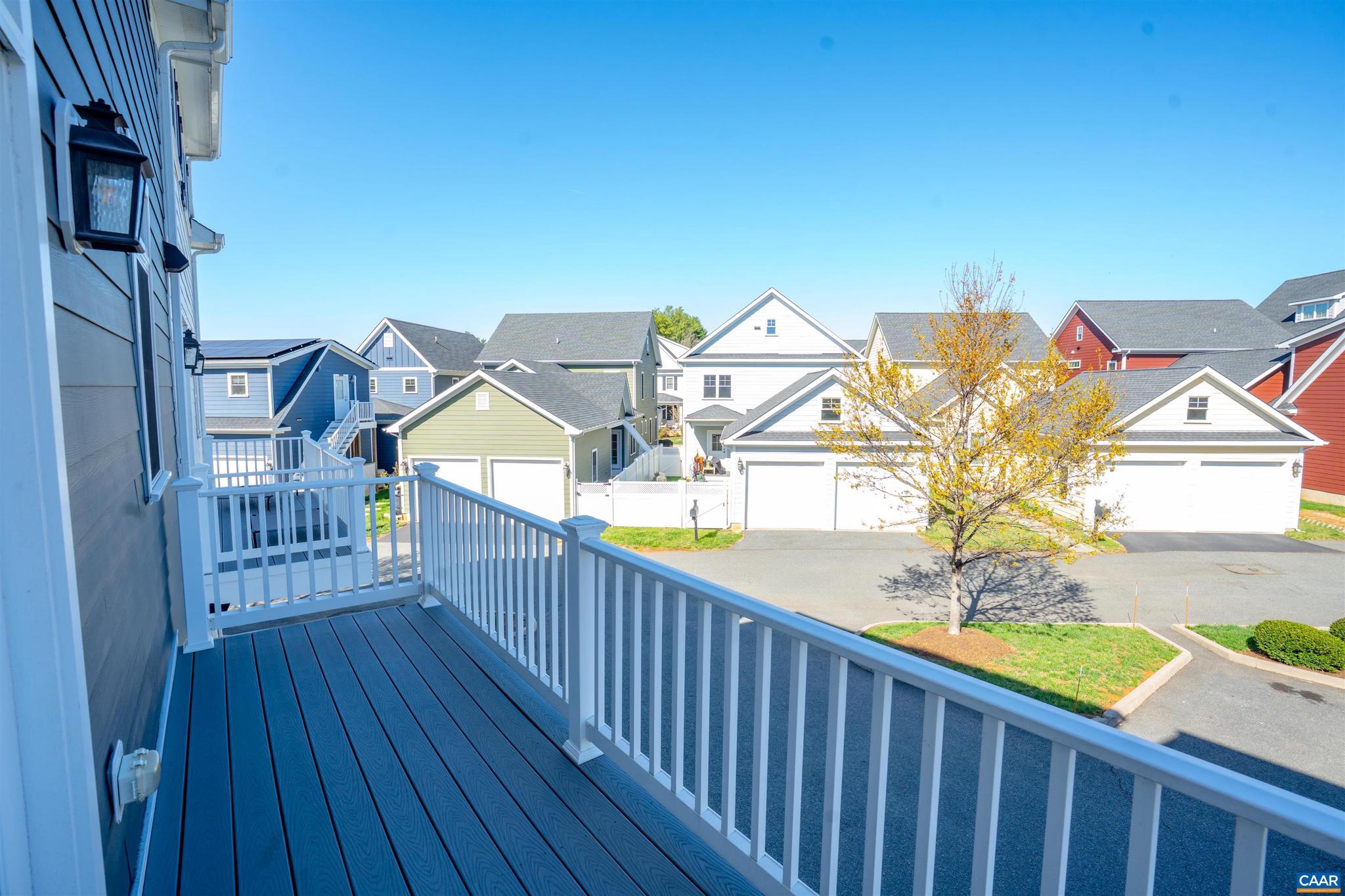 528 Trailside Drive Charlottesville, VA 22911 - Photo 21 of 51 a view of a balcony with wooden floor and iron fence