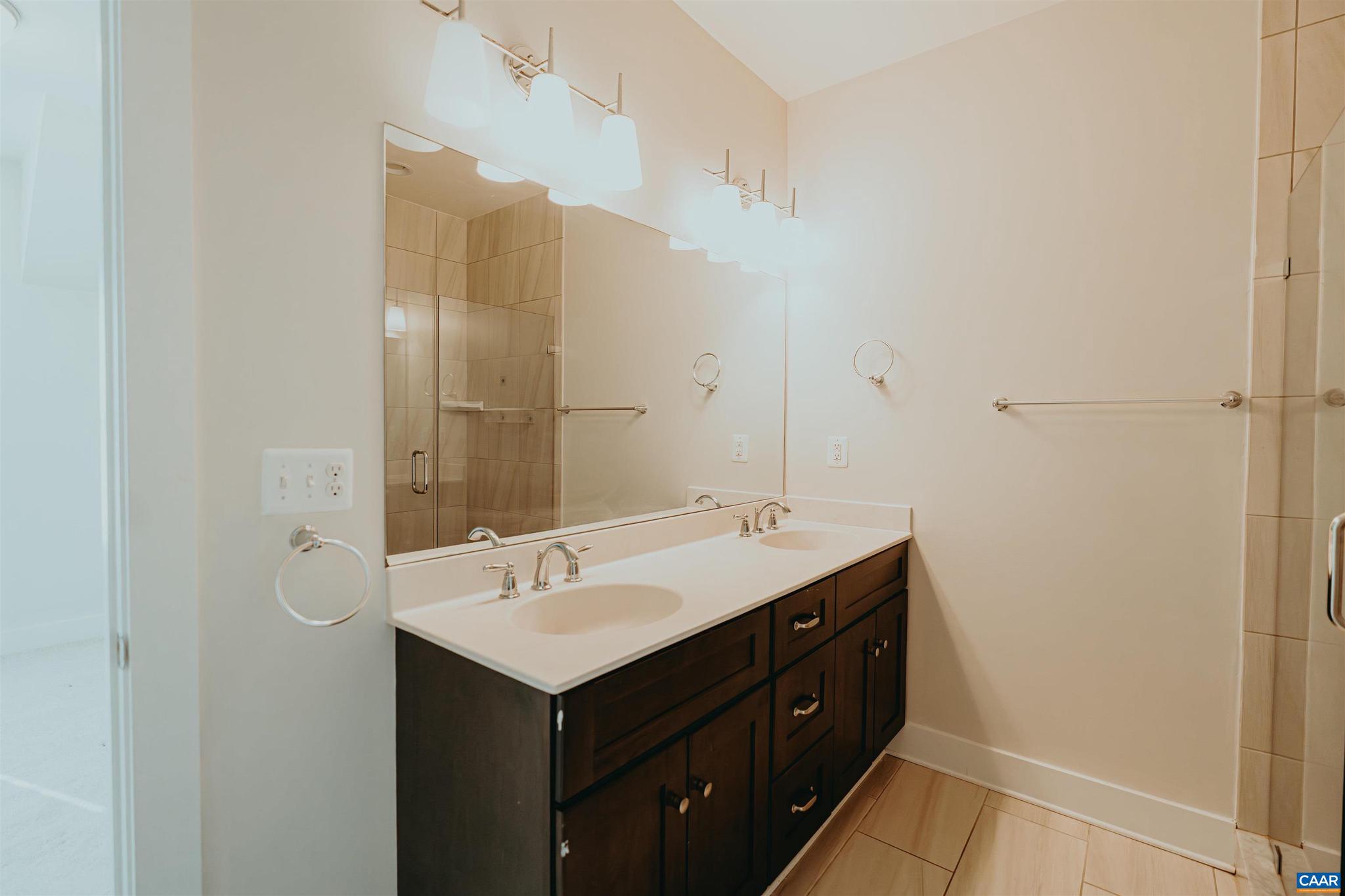 528 Trailside Drive Charlottesville, VA 22911 - Photo 28 of 51 a bathroom with a sink and mirror
