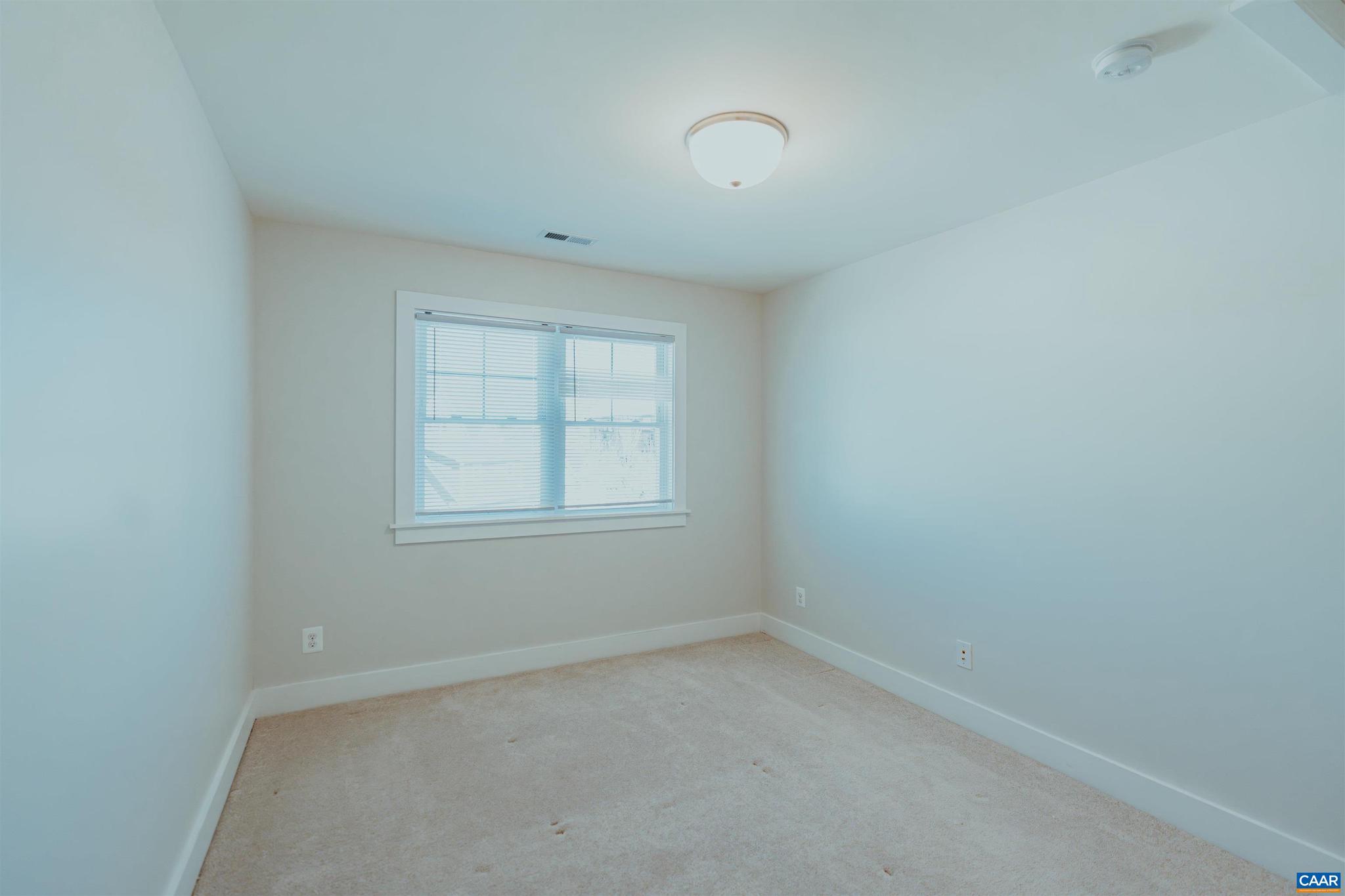 528 Trailside Drive Charlottesville, VA 22911 - Photo 41 of 51 an empty room with a window