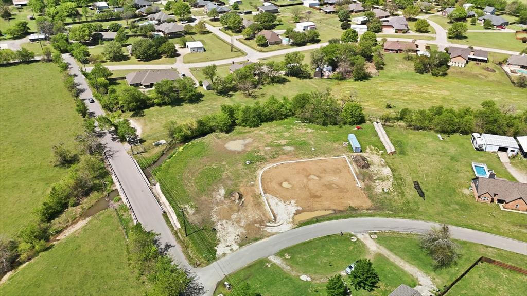 501 Rising Star Lane Sanger, TX 76266 - Photo 6 of 17 an aerial view of a house with a yard and lake view