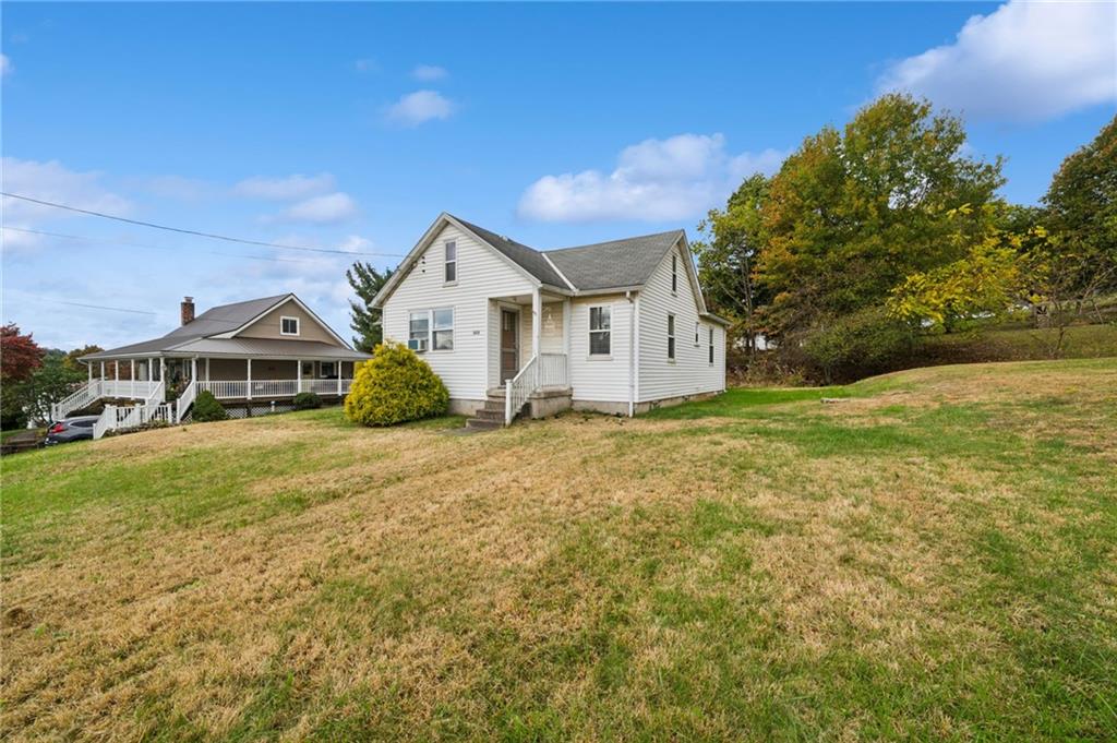3425 Garvers Ferry Road New Kensington, PA 15068 - Photo 7 of 33 a front view of a house with yard