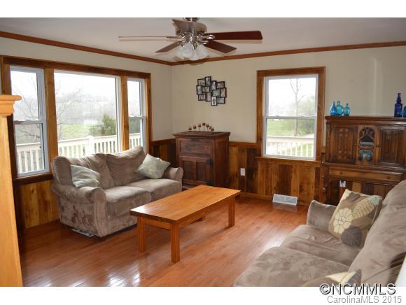 329 Ridgedale Road Clyde, NC 28721 - Photo 10 of 22 a living room with furniture and a window