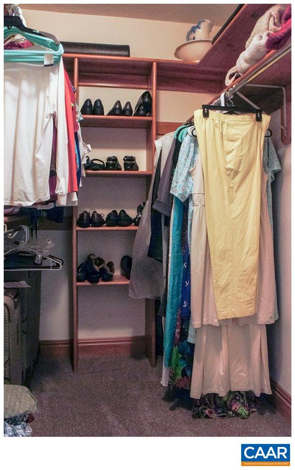 68 Amethyst Road Palmyra, VA 22963 - Photo 11 of 30 a view of walk in closet with clothes and shoes