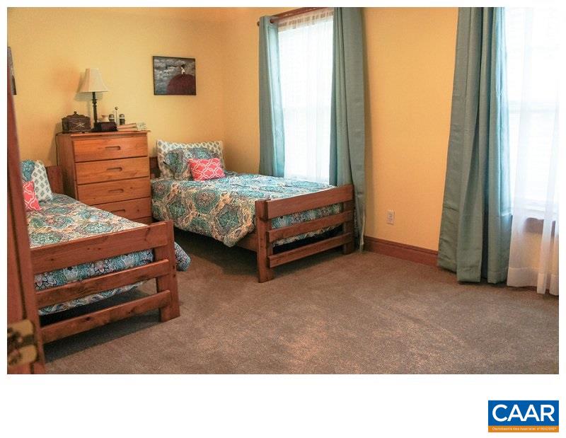 68 Amethyst Road Palmyra, VA 22963 - Photo 18 of 30 a bedroom with furniture and window