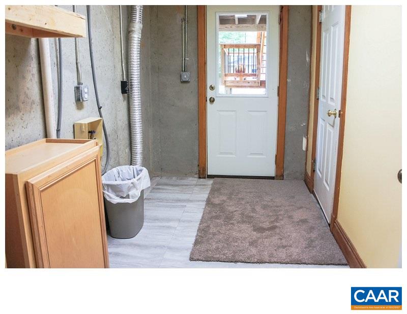 68 Amethyst Road Palmyra, VA 22963 - Photo 21 of 30 a room with wooden floor and a potted plant