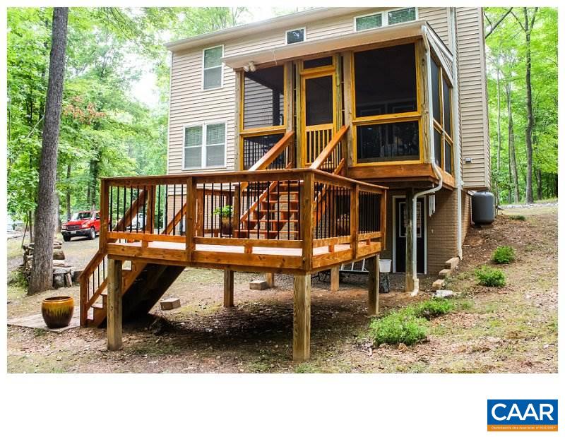 68 Amethyst Road Palmyra, VA 22963 - Photo 3 of 30 a backyard of a house with yard barbeque oven and outdoor seating