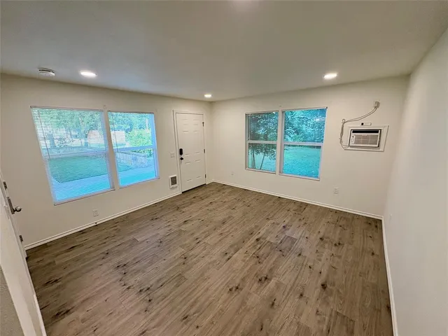 an empty room with windows