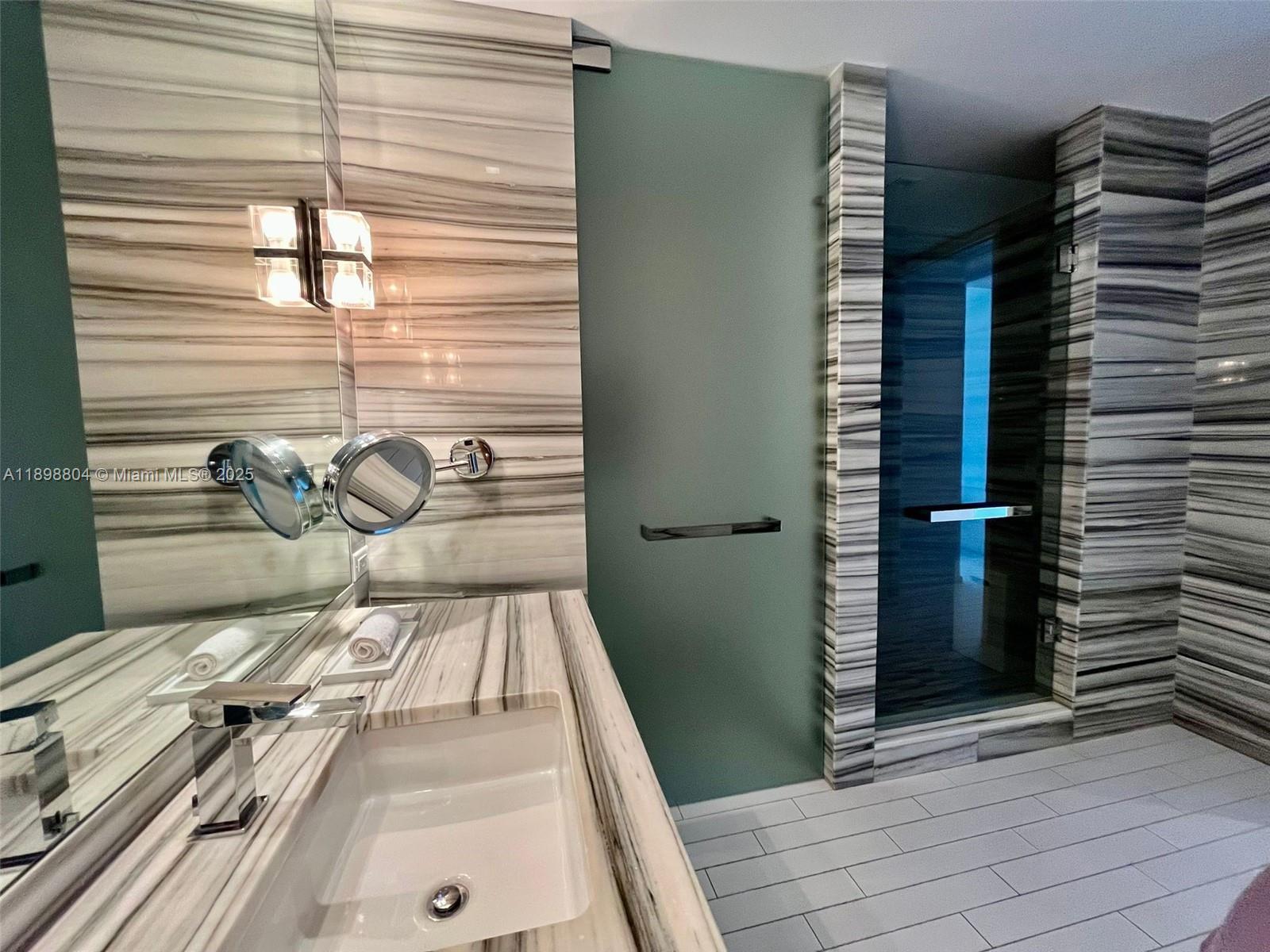 2201 Collins Avenue, Unit 626 Miami Beach, FL 33139 - Photo 4 of 12 a view of a balcony with a door and a window