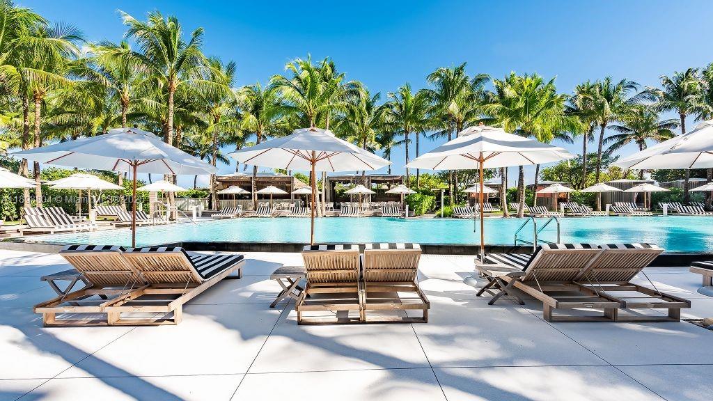 2201 Collins Avenue, Unit 626 Miami Beach, FL 33139 - Photo 5 of 12 a patio with patio area and outdoor seating