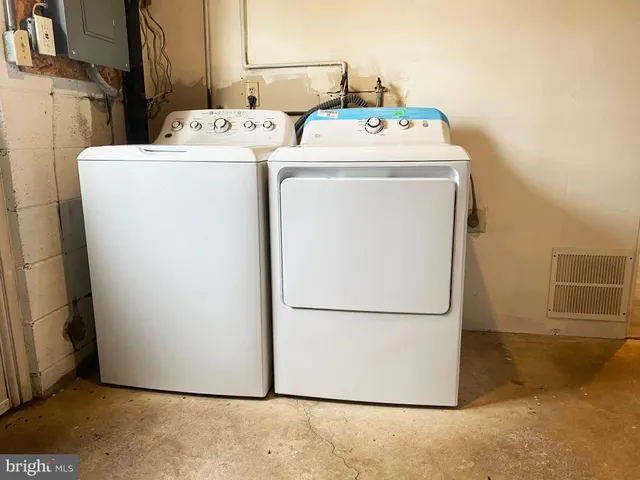 a utility room with dryer and washer