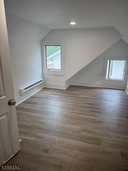 252 Spring Street Newton, NJ 07860 - Photo 11 of 18 an empty room with wooden floor and windows