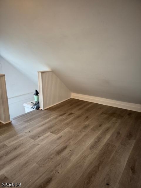 252 Spring Street Newton, NJ 07860 - Photo 14 of 18 a view of empty room with wooden floor
