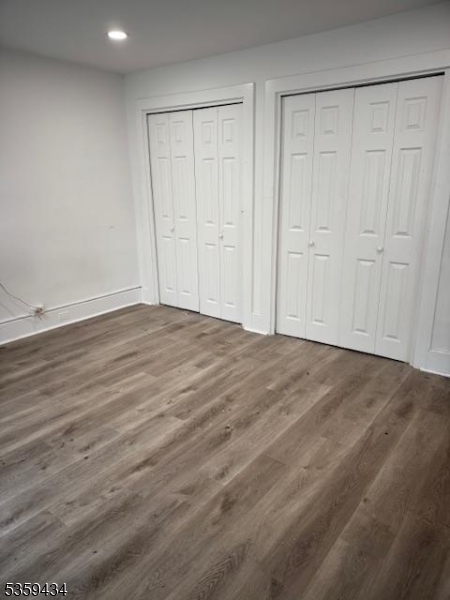 252 Spring Street Newton, NJ 07860 - Photo 4 of 18 a view of an empty room with wooden floor