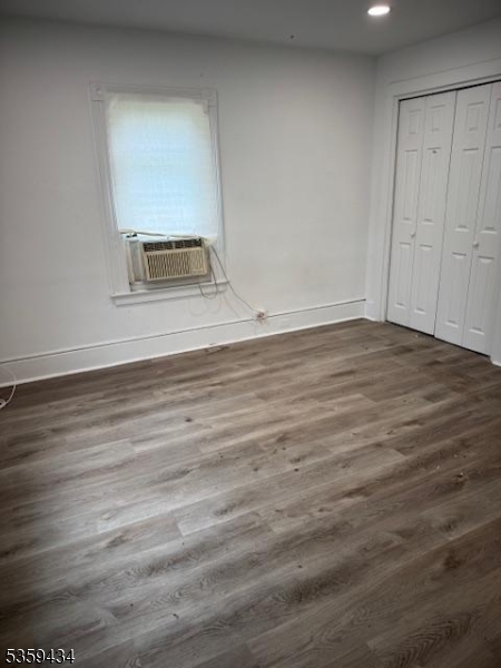 252 Spring Street Newton, NJ 07860 - Photo 6 of 18 a view of empty room with wooden floor