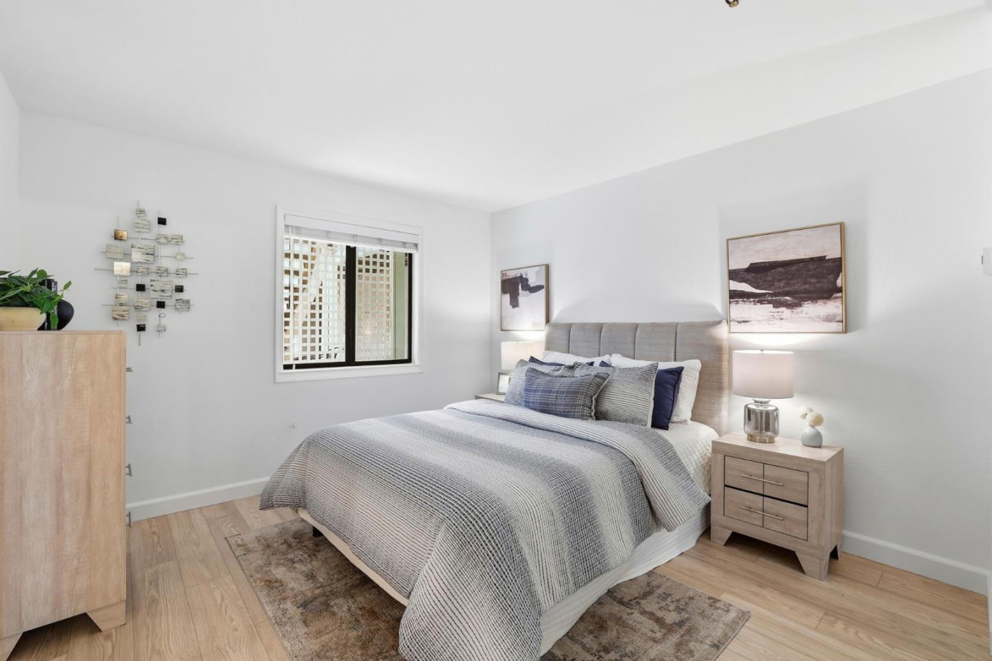 449 Alberto Way, Unit 132 Los Gatos, CA 95032 - Photo 12 of 42 a bedroom with a bed and a window