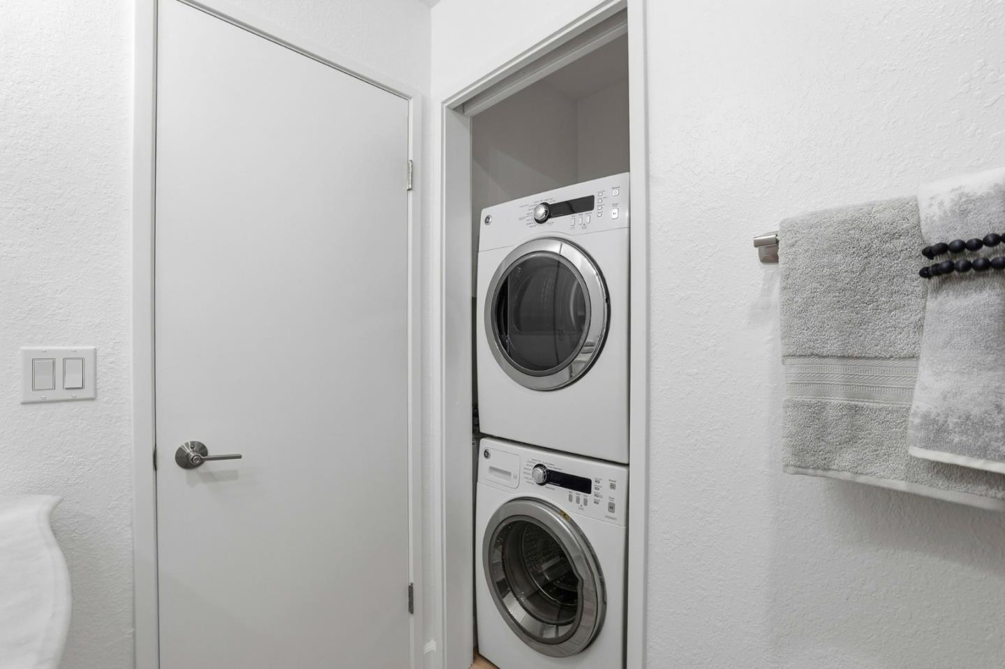 449 Alberto Way, Unit 132 Los Gatos, CA 95032 - Photo 21 of 42 a utility room with dryer and washer