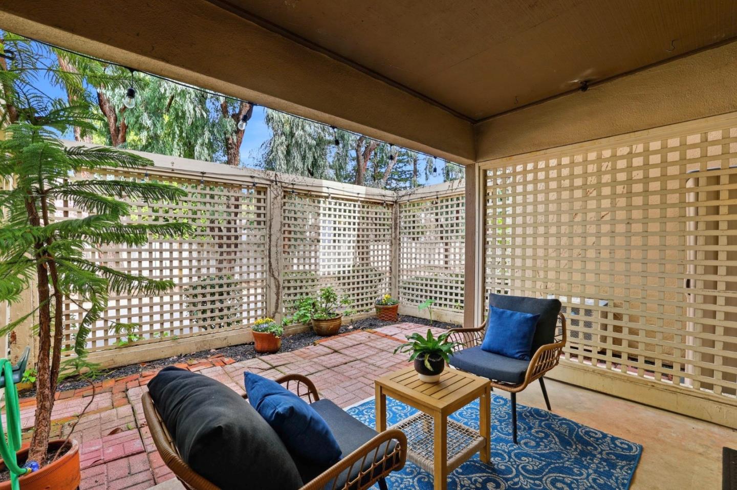 449 Alberto Way, Unit 132 Los Gatos, CA 95032 - Photo 22 of 42 a outdoor living space with furniture and a potted plant
