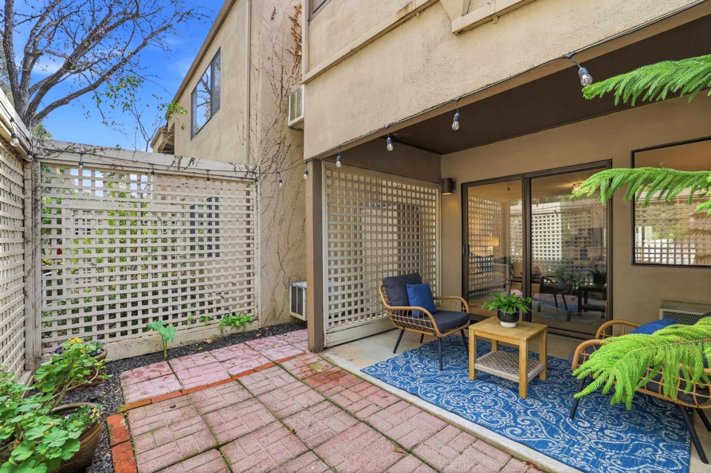 449 Alberto Way, Unit 132 Los Gatos, CA 95032 - Photo 26 of 42 a building outdoor space with patio furniture and potted plants