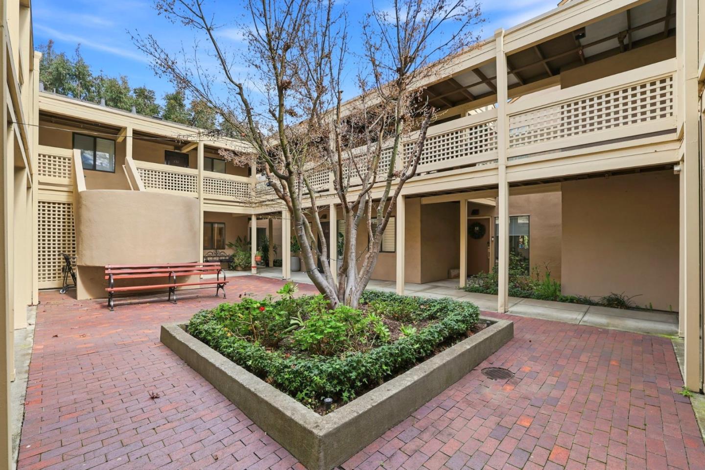 449 Alberto Way, Unit 132 Los Gatos, CA 95032 - Photo 33 of 42 a view of house with backyard
