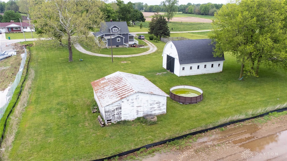 190 Swailes Road Troy, OH 45373 - Photo 48 of 82 This expansive lot features a charming home, a classic barn, and a versatile outbuilding.