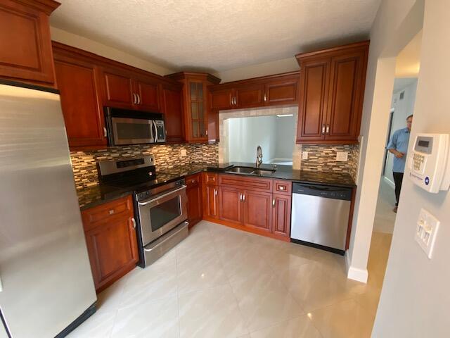 5150 East Club Circle, Unit 103 Boca Raton, FL 33487 - Photo 4 of 9 IMG_4927