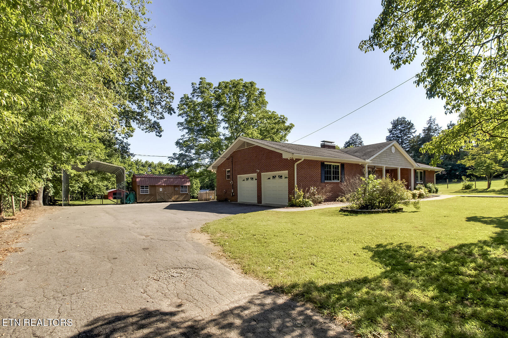 7022 East Emory Road Corryton, TN 37721 - Photo 42 of 60 42_EEmoryRoad_7022_GarageSide