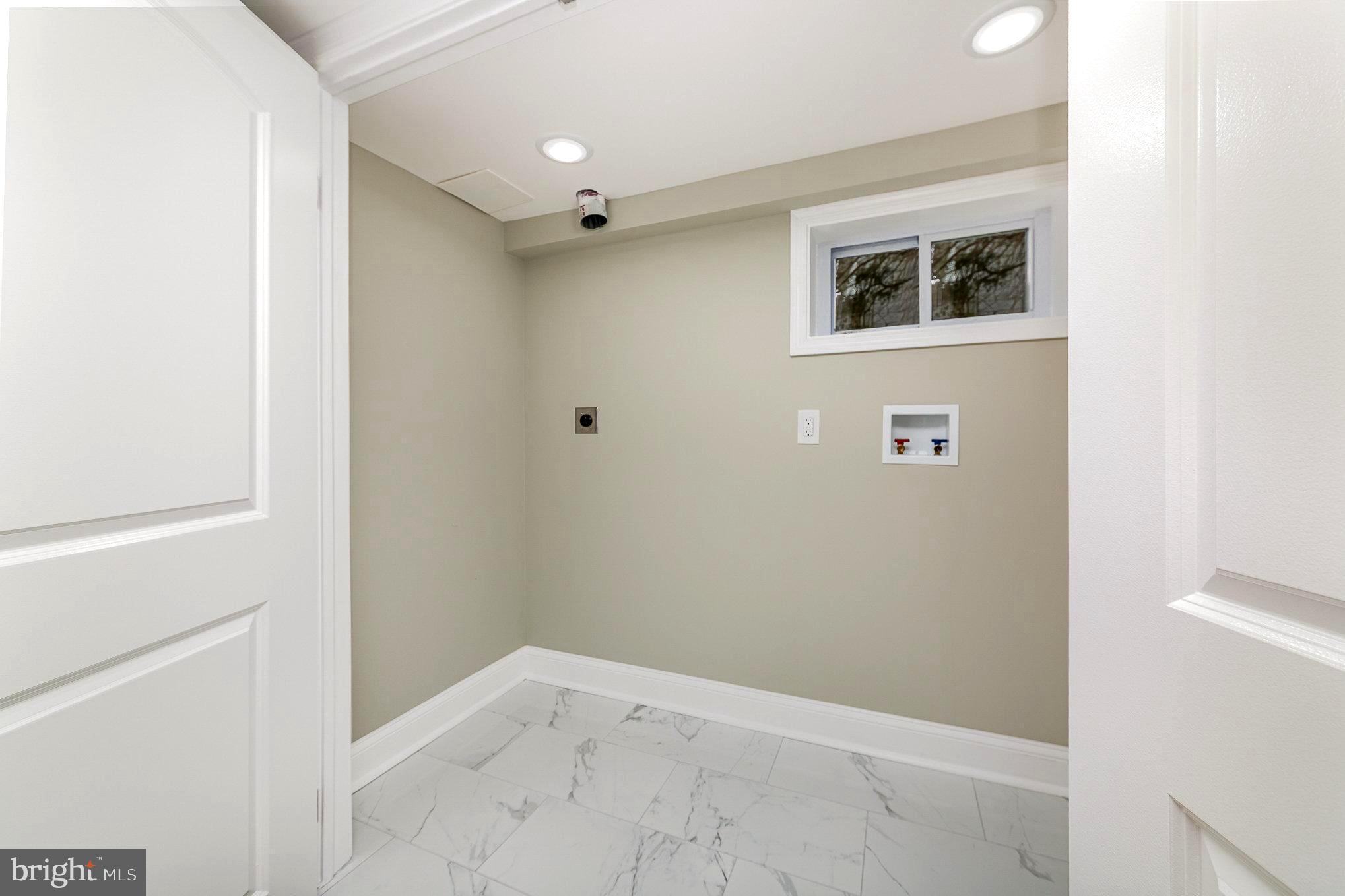 5611 Pilgrim Road Baltimore, MD 21214 - Photo 28 of 35 a view of an empty room