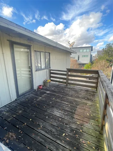 a bedroom with a bed and cabinets