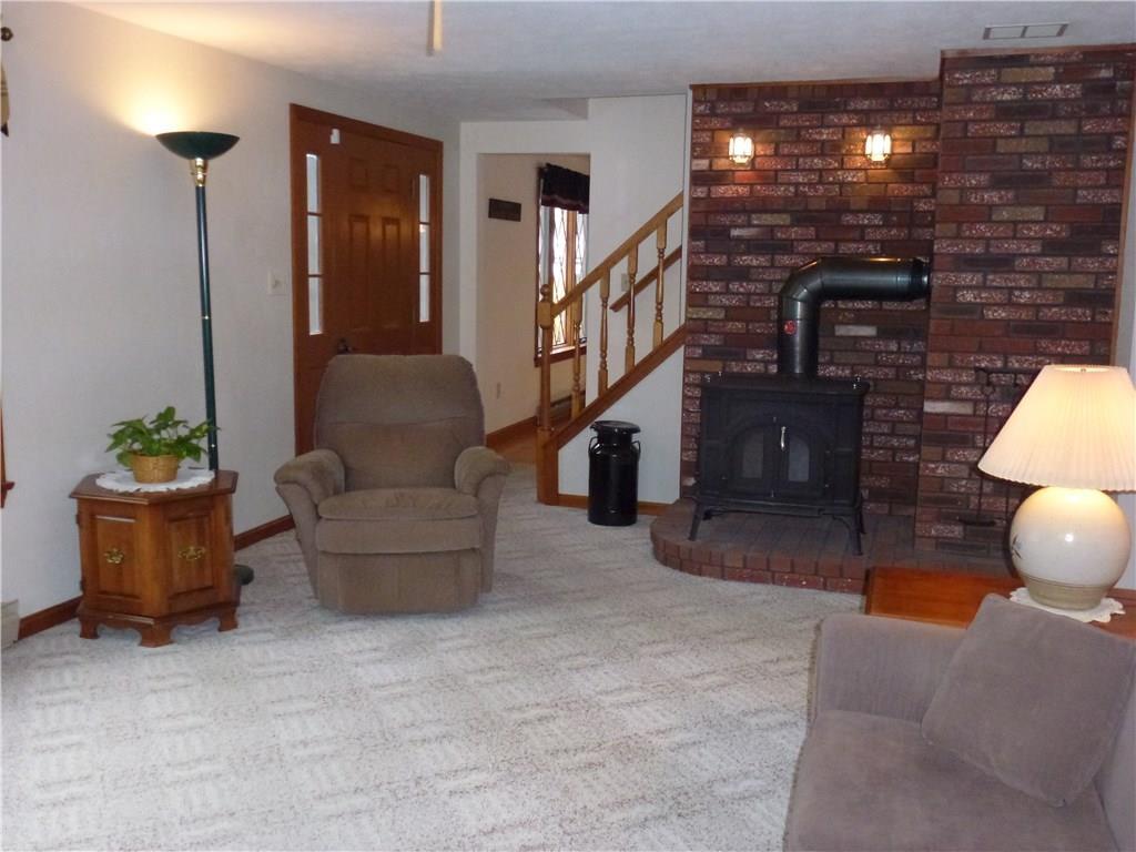 734 Lebanon Road North Berwick, ME 03906 - Photo 20 of 35 Living room with wood stove