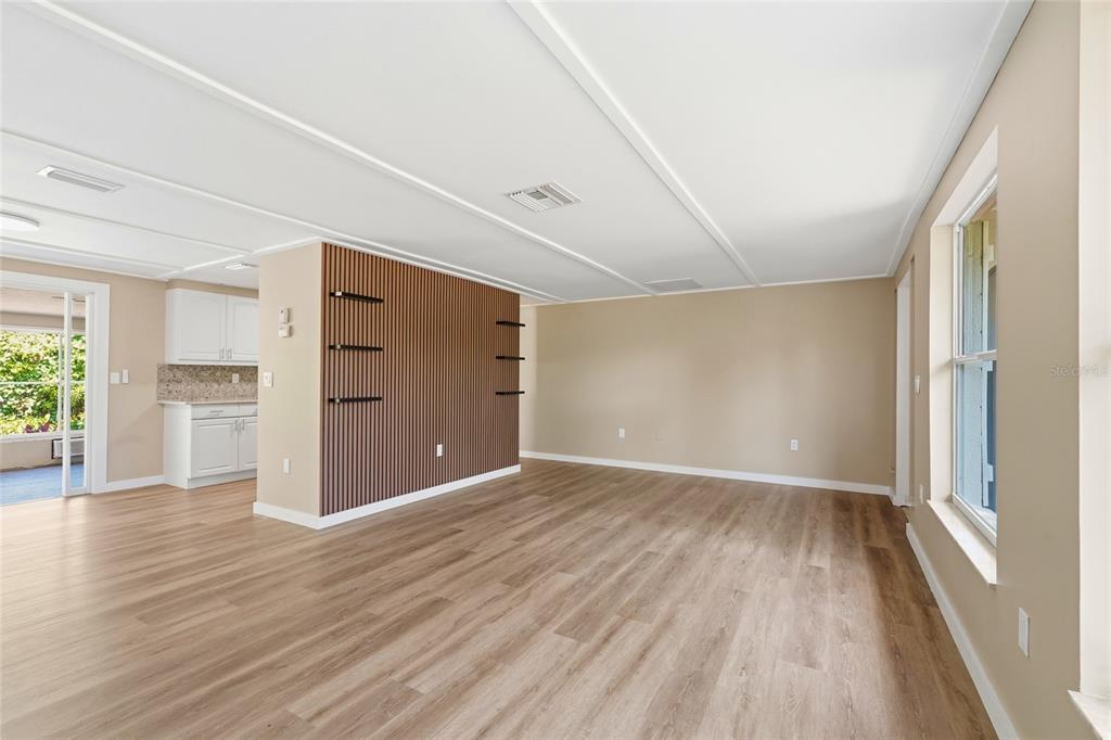 5984 Diana Road Venice, FL 34293 - Photo 9 of 36 a view of an empty room with a window