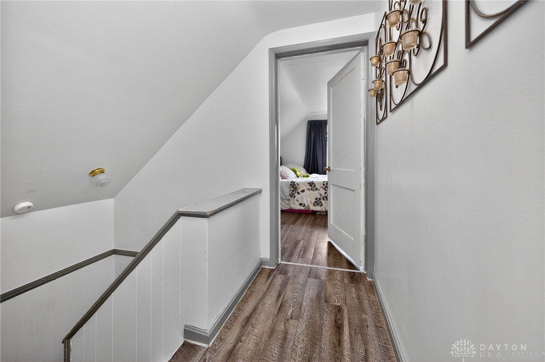 3301 Wildwood Road Middletown, OH 45042 - Photo 39 of 68 This interior hallway features sleek flooring leading to a sunlit room.
