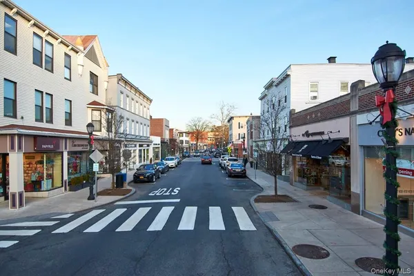 a view of a street with cars