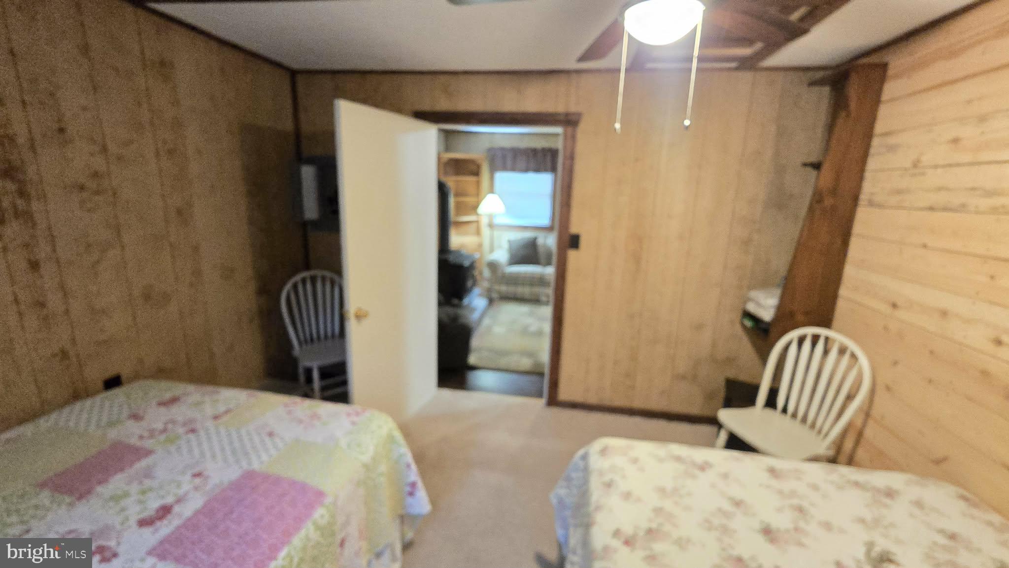 8245 Aughwick Road Fort Loudon, PA 17224 - Photo 11 of 26 a bedroom with a bed and a window