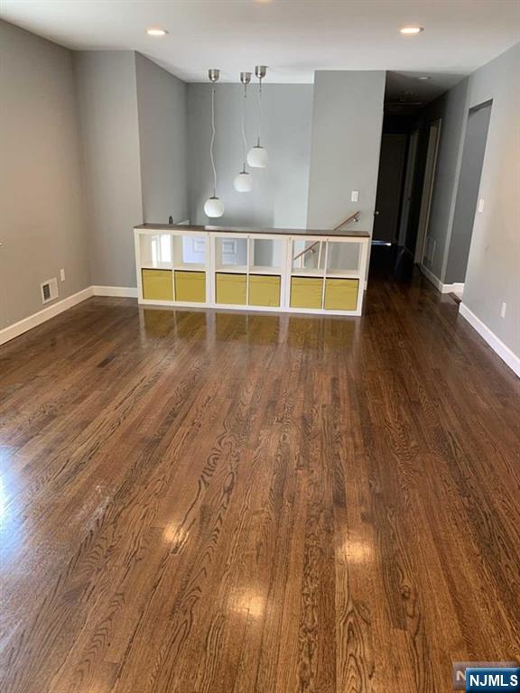 225 Doxey Drive Park Ridge, NJ 07656 - Photo 23 of 30 an empty room with wooden floor