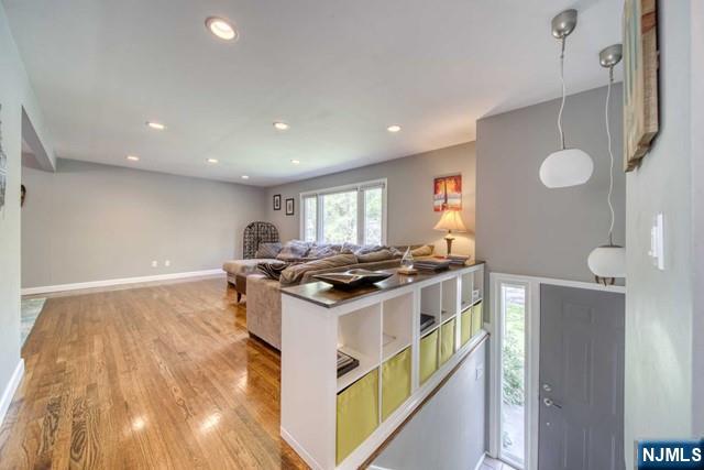 225 Doxey Drive Park Ridge, NJ 07656 - Photo 3 of 30 a kitchen that has a stove and a wooden floors