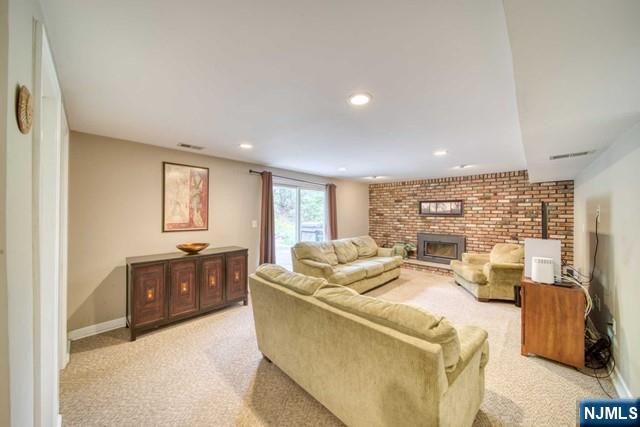 225 Doxey Drive Park Ridge, NJ 07656 - Photo 5 of 30 a living room with furniture and a window