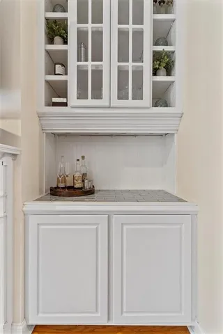 a kitchen with a cabinets and window