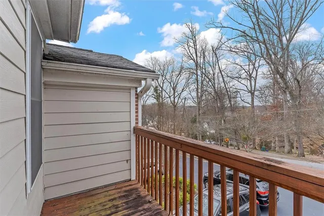 a view of a balcony with a pot