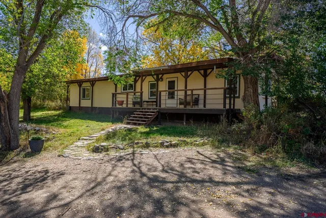 front view of house with a yard