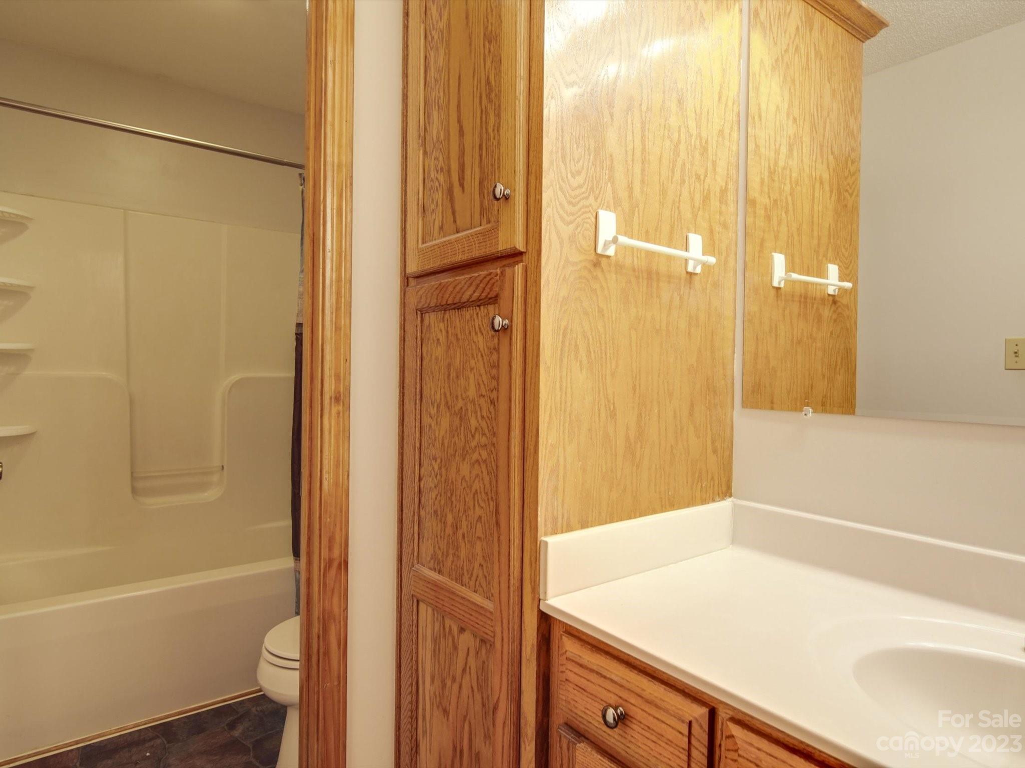 5351 Faith Road Salisbury, NC 28146 - Photo 17 of 32 a bathroom with a tub and shower