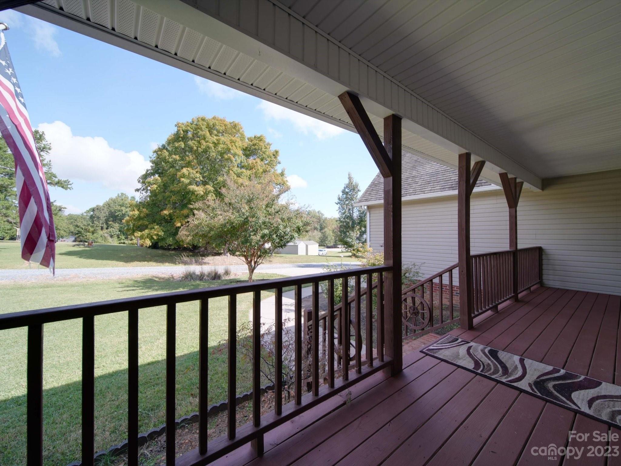 5351 Faith Road Salisbury, NC 28146 - Photo 5 of 32 a view of balcony with wooden floor